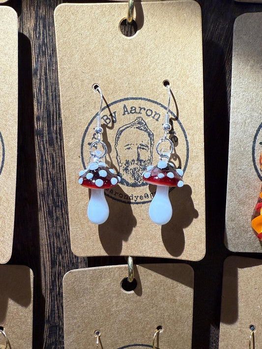 Colorful blown glass mushroom earrings on silver hooks